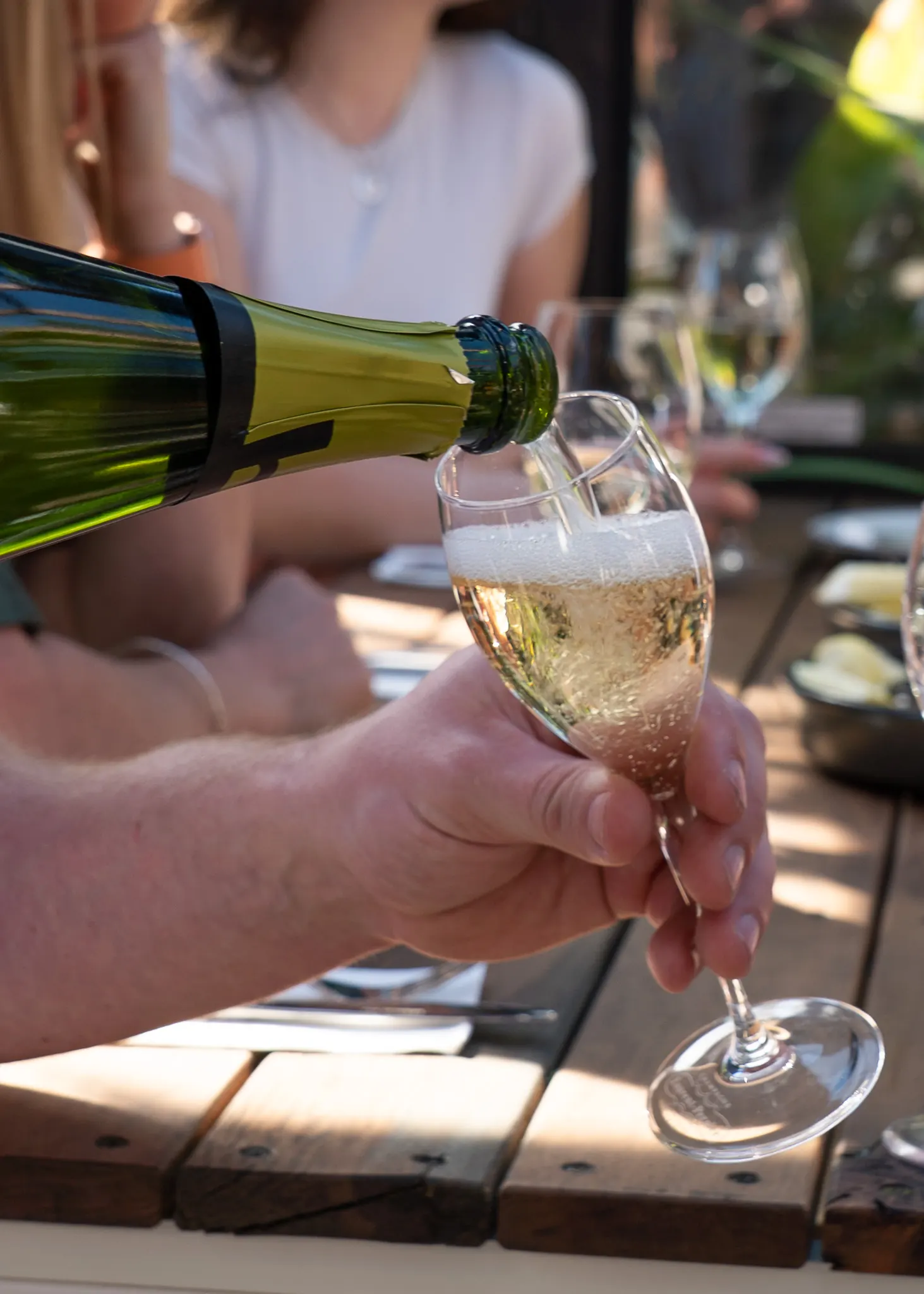 a glass of sparkling poured