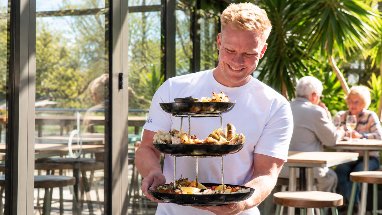 the seafood tower carried out to the terrace at babylon