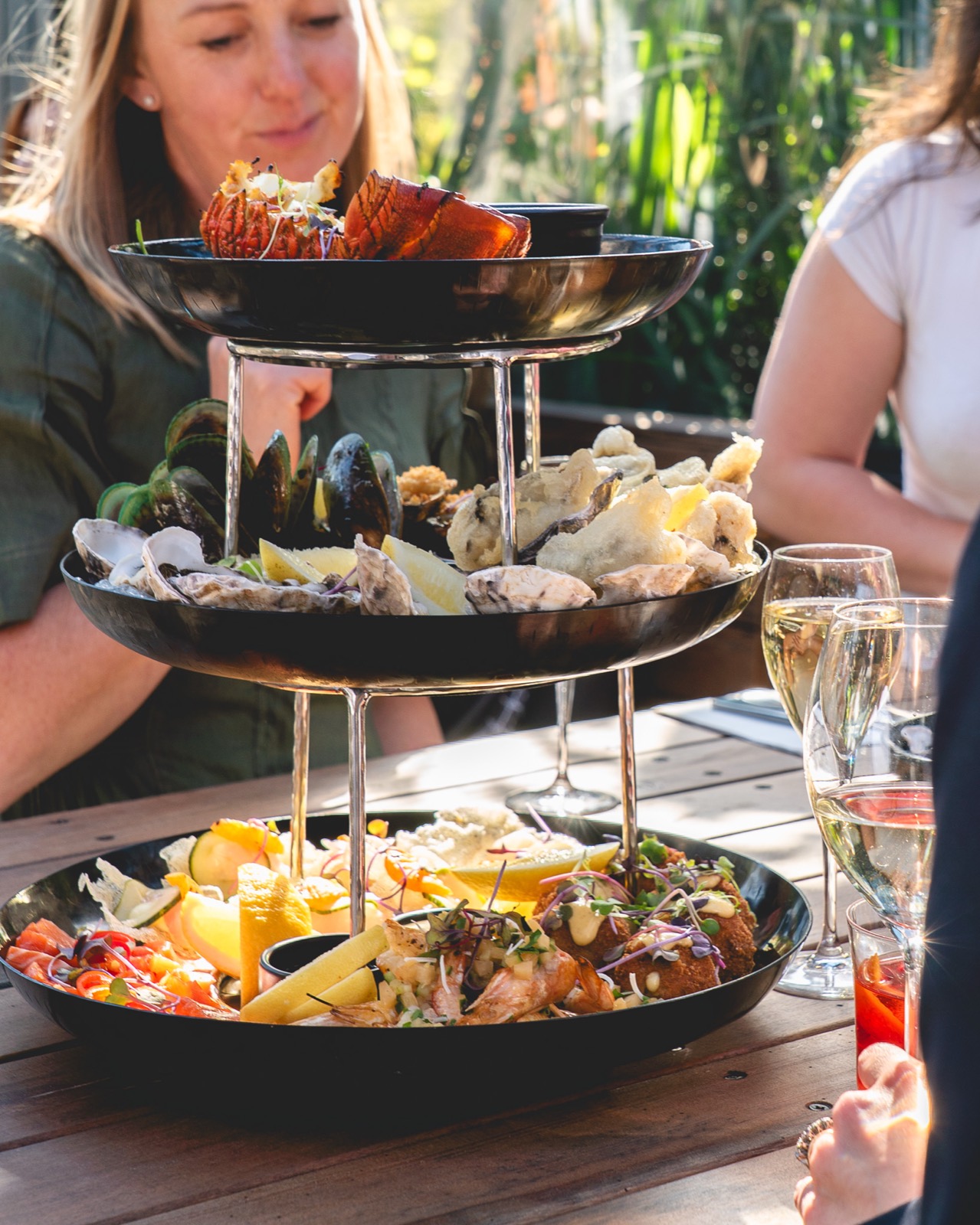 the full seafood tower in the afternoon sun