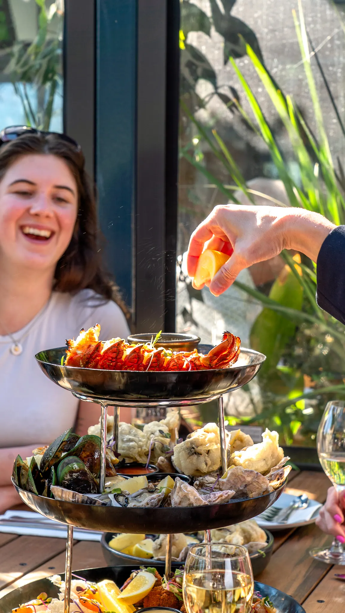 laughing over the seafood tower